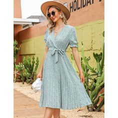 This women's summer beach dress is made from soft, comfortable, and breathable fabric ideal for summer wear. It features a wrap V-neck, printed design, pleated details, short lantern sleeves, elastic high waist, A-line silhouette, elegant hem, and belt for a casual yet elegant look. Suitable for various occasions like school, work, beach outings, weddings, and more, the dress can be dressed up or down for a lively and elegant appearance. Pair with high heels, wedges, flats, or sandals for a styl Green Floral Print Maxi Length V-neck Dress, Summer Maxi Length V-neck Dress For Brunch, Summer Maxi V-neck Dress For Brunch, Casual Green V-neck Dress With Floral Print, Green Midi Dress With Surplice Neckline For Beach, Summer Brunch V-neck Dress With Short Sleeves, Green V-neck Knee-length Dress For Spring, Flowy Midi Length V-neck Dress For Vacation, Green V-neck Midi Dress For Beach