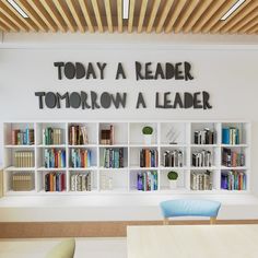 there is a sign that says today a reader, tomorrow a leader on the wall