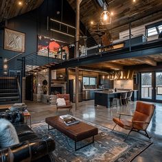 a living room filled with furniture and a fire place in the middle of a building