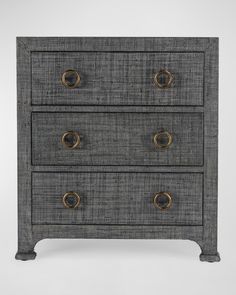 an antique chest of drawers with brass handles and knobs on the front, against a white background