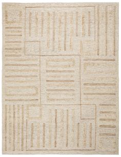 a beige rug with squares and lines on it