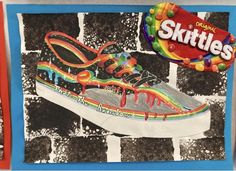 a drawing of a pair of sneakers with gummy shoes on it and a bag of skittles in the background