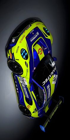 a yellow and blue helmet on top of a black background