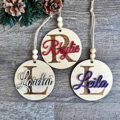 personalized christmas ornament with the letter d and name in red, blue, and purple