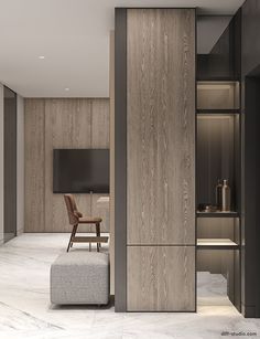 a living room filled with furniture next to a tall book shelf and shelves on either side of the wall