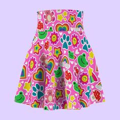 This adorable skirt will have you twirling like a human rainbow. Made with a cheerful blend of colors, it features colorful shapes that will put a smile on your face. The cute kawaii print and playful design make this skirt perfect for anyone young at heart who wants to add a dash of joy and whimsy to their wardrobe. Simply slip it on over leggings on a lazy day or pair it with a basic top and sneakers for an effortlessly chic weekend outfit. This TOKI TOKI skirt is ideal for ballet class, play dates at the park, or just dancing around the house. With its menagerie of colorful rainbows and silly animals, this skirt promises to become your new go-to for instantly putting you in a festive mood. ◬ 95% Polyester 5% Spandex ◬ Versatile fit ◬ Light fabric ◬ Runs true to size ◬ Skater skirt style Menhera Kei, Kawaii Kidcore, Cute Bottoms, Colorful Skirt, Harajuku Clothes, Colorful Skirts, Ballet Class, Young At Heart, Lazy Day