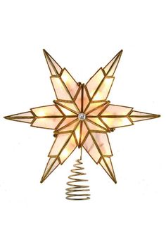 a christmas tree topper with lights hanging from it's sides and a star design on