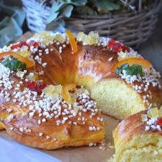 there is a bundt cake with many toppings on it