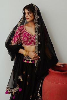 Black chanderi woven lehenga with dori hand embroidery. Comes with a blouse and a dupatta.
Components: 3
Pattern: Hand embroidered
Type Of Work: Dori
Neckline: Sweetheart
Sleeve Type: Half
Fabric: Chanderi
Color: Black
Other Details: 
Tasseled waistband on lehenga
Occasion: Sangeet - Aza Fashions Diwali Embroidered Lehenga For Traditional Ceremonies, Designer Chinon Choli With Sheer Dupatta, Embroidered Dola Silk Choli For Traditional Ceremonies, Embroidered Lehenga For Traditional Ceremonies At Diwali, Embroidered Lehenga For Diwali And Traditional Ceremonies, Resham Embroidery Lehenga For Traditional Ceremonies, Semi-stitched Lehenga With Resham Embroidery For Traditional Ceremonies, Chanderi Choli With Resham Embroidery For Eid, Traditional Pre-draped Saree With Sheer Dupatta For Navratri