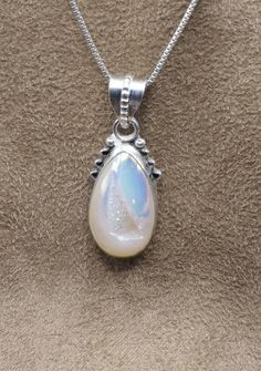 "Beautiful Druzy Quartz Pendant Comes with 18\" Sterling Silver chain Top: 30 mm x 16 mm; 1-1/4\" x 5/8\" Weight 5.9 Grams Sterling Silver 925, Handmade $75 Exclusively Designed by Richard James for Richlo Jewelry Check out our other fine jewelry at: https://www.etsy.com/shop/arizonagemstudio" Teardrop Cabochon Necklace For Anniversary, Anniversary Teardrop Cabochon Necklace, Anniversary Cabochon Teardrop Necklace, White Sterling Silver Pendant Crystal Necklace, White Sterling Silver Crystal Pendant Necklace, Iridescent Nickel-free Sterling Silver Necklace, White Sterling Silver Crystal Necklace With Round Pendant, Elegant Hypoallergenic Jewelry For Memorial, Elegant Hypoallergenic Jewelry For Memorials