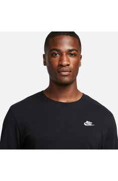 A small Swoosh logo at the chest brings big Nike energy to a T-shirt made from breathable cotton for comfort whether you're working out or just hanging out. 28" length (size Medium) Crewneck Long sleeves 100% cotton Machine wash, tumble dry Imported Casual Gym Tops With Branding, Black Three Stripes Gym T-shirt, Black Gym T-shirt With Three Stripes Branding, Casual Activewear With Three Stripes And Crew Neck, Nike Basic Crew Neck Activewear, Nike Sporty Crew Top, Sporty Crew Neck T-shirt For Sports, Sporty Crewneck T-shirt For Sports, Crew Neck T-shirt With Three Stripes Branding For Workout