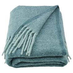 a blue blanket with fringes on it