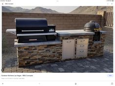 an outdoor bbq grill with two ovens on it