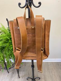 Women's Cowhide Travel Backpack Handcrafted rucksack made from full-grain cowhide Size: 13" (H) x 8" (L) x 5" (W) Distressed Hunter Backpack Perfect for daily use / school / short adventures storing up to 12" Laptop , Cell Phone and other accessories Can be used as Leather backpack, iPad bag, laptop bag, leather school bag, rucksack, adventure bag, travel bag, college bag For men and women Fits up to 12" Devices: Introducing our premium Full Grain Cowhide Leather Backpack, a stylish and durable Rectangular Leather Backpack For School, Travel Leather Backpack With Vegetable Tanned Leather, Travel Leather Backpack With Vegetable-tanned Leather, Travel Backpack With Vegetable Tanned Leather And Leather Lining, Leather Backpack For Everyday Use, Leather Rectangular Backpack For Everyday Carry, Vegetable Tanned Leather Backpack With Leather Backing, Waxed Leather Satchel Backpack, Daily Backpack With Leather Backing In Vegetable Tanned Leather