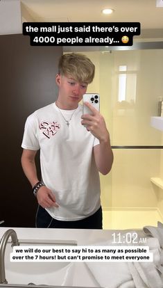 a young man taking a selfie in front of a bathroom mirror with the caption that reads, we will do our best to pay it as many as many as possible over the 7 hours