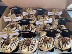 cupcakes decorated with graduation caps and ribbons