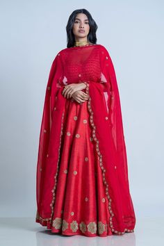 Red raw silk floral embroidered lehenga with attached cancan. Paired with wide V-neck padded blouse and dupatta.
Component: 3
Pattern: Embroidery
Type Of Work: Floral
Neckline: Wide V
Sleeve Type: Half
Fabric: Blouse and Lehenga: Raw Silk; Dupatta: Organza
Color: Red
Other Details: 
Lehenga Length: 42 inches
Scallop embroidered border dupatta
Tassel tie-up detailing
Note: The neckpiece worn by the model is not for sale
Occasion: Bride,Wedding - Aza Fashions Red Floral Blouse, Organza Embroidery, Padded Blouse, Red Lehenga, Embroidered Lehenga, Embroidered Border, Red Blouse, Bridal Lehengas, Embroidery Floral