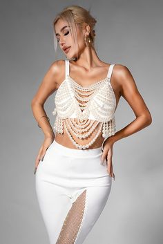 Brailynn Pearl Chain Fringe Top - Elegant and Alluring Pearl-Adorned Vacation Top – Acmefun Elegant White Club Top, Elegant White Tops For Club, Chic Fringe Crop Top, Glamorous Party Top With Beaded Straps, Glamorous Beaded Fringe Top For Party, Glamorous Party Tops With Beaded Fringe, Elegant Spring Top With Rhinestone Fringe, Elegant Party Tops With Rhinestone Fringe, Chic Fringe Tops For Party