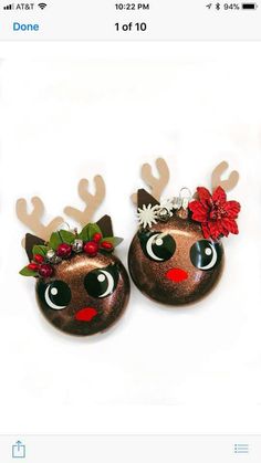 two christmas ornaments with reindeer noses and flowers on them