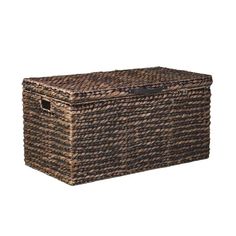 a brown wicker box with handles