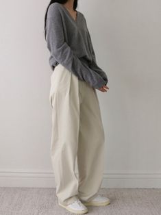 Chic, classic trendy cotton pants with wide leg and two pin tucks. Extra wide leg creates a chic silhouette and comfortable fit. Model is in MINUSEY S. ✔️ Free worldwide express shipping over $100✔️ Loved by 6,500+ customers✔️ Limited edition collections, maximum style⠀⠀⠀⠀⠀⠀⠀⠀⠀Stay ahead of the trend with can’t-find-anywhere-else staples. Your closet will thank you 💕 * MINUSEY S = EU 34, US 2* MINUSEY M = EU 36, US 4* 100% Cotton* Dry clean* Made in Korea - Model Height: 172cm/5'7" (US2, EU34) Chic Cotton Wide Leg Pants For Fall, Chic Wide Leg Cotton Pants For Work, Chic Beige Wide Leg Cotton Pants, Classic Cotton Wide Leg Pants, Chic Relaxed Fit Cotton Wide Leg Pants, Chic Cotton Wide Leg Pants With Relaxed Fit, Chic Solid Cotton Wide Leg Pants, Chic Cotton High Waist Wide Leg Pants, Chic Cotton High-waisted Wide Leg Pants