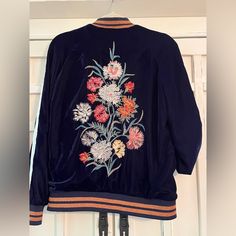 Zara Trafaluc Outerwear Navy Blue Velvet Bomber Jacket Embroidered On Back So Cute Nwot Size Med Zara Winter Outerwear With Floral Embroidery, Elegant Blue Embroidered Outerwear, Zara Floral Embroidery Winter Outerwear, Embroidered Denim Blue Outerwear, Winter Floral Embroidered V-neck Outerwear, Color Block Coats, Cut Blazer, Sleeveless Blazer, Navy Blue Velvet