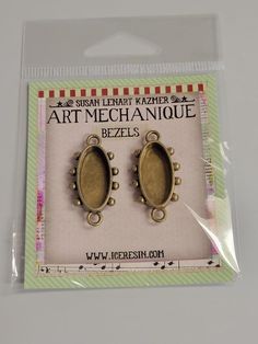 pair of antique brass plated art mechanique bezels for crafting