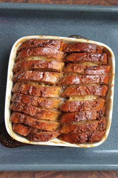 a casserole dish with meat in it on a tray