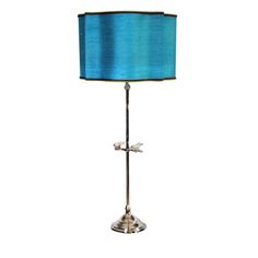 a table lamp with a blue shade on it