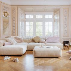 a living room filled with lots of furniture