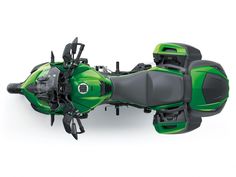 a green motorcycle is shown from above