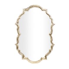 an oval mirror on a white wall