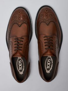 Upper: 100% Calf leather Sole: 100% Rubber Luxury Wingtip Oxfords With Leather Lining, Timeless Brown Lace-up Shoes With Rubber Sole, Luxury Wingtip Leather Shoes With Goodyear Welt, Luxury Goodyear Welted Wingtip Leather Shoes, Designer Oxfords With Brogue Detailing And Almond Toe, Luxury Goodyear Welted Oxfords With Round Toe, Luxury Goodyear Welted Round Toe Oxfords, Luxury Calf Leather Wingtip Oxfords, Luxury Wingtip Oxfords In Calf Leather