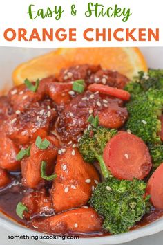 an orange chicken dish with broccoli and carrots