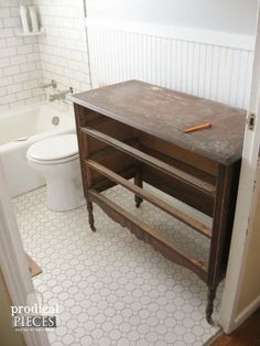 a bathroom with a sink, toilet and bathtub