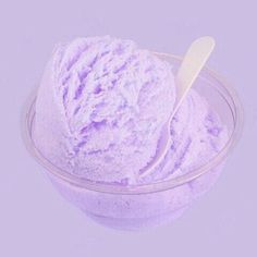 a scoop of lavender ice cream in a bowl