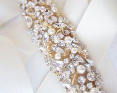 Bridal belt sash Bridal Swarovski crystal belt sash Wedding | Etsy Elegant Bedazzled Bridal Belt For Wedding, Elegant Gold Bridal Belt For Reception, Glamorous Embellished Bridal Belt For Wedding, Glamorous Wedding Bridal Belt With Crystals, Elegant Bedazzled Wedding Sash, Elegant Embellished Bridal Belt For Mother Of The Bride, Elegant Embellished Bridal Belt For Evening, Elegant Embellished Bridal Belt For Wedding, Elegant Embellished Sashes