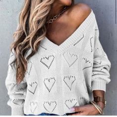 Oversized V-Neck Hearts Knit Pattern Sweater. 3/4 Length Sleeve. Please Note: Model In Photo Is Size Small, Wearing A Large. Knitted Heart Pattern, Yellow Knit Sweater, Knitted Heart, Cream Knit Sweater, Ribbed Turtleneck Sweater, Cashmere Sweater Women, Dolman Sleeve Tops, Yellow Knit, Oversize Knit