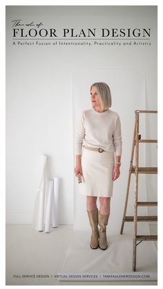 a woman standing in front of a white wall wearing boots and a sweater with the words floor plan design on it