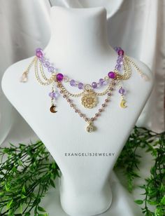 Violet Beaded Princesscore Grunge Necklace is crafted with glass beads, acrylic beads and gold plated  brass chains and accents . It is 14" and has an extansion chain. If you want to change the length,I can customize this product for you.  Please do not wear the necklace while sleeping, showering or doing sports. I advise you to try to keep it away from water, chemicals and perfumes. If you have any request please do not hesitate to ask. Thanks for stop by For more visit my shop: ExangelsJewelry Jewelry Cottagecore, Cottagecore Necklace, Fairycore Necklace, Otherworldly Beauty, Grunge Necklace, Necklace Inspiration, Grunge Fairycore, Hippie Necklace, Pretty Necklaces