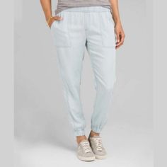 Add Comfort To Your Casual Excursions With The Distinctive Prana Aberdeen Jogger Pants. This Slouched, Midrise Design Features An Elastic Waistband, Front Patch Pockets And Back Welt Pockets. Constructed From Woven Lenzing Tencel Lyocell Denim Gathered Ankle Cuffs Color Is A Light/White Washed Blue/Green New Without Tags! Item Has Been Washed Casual Fitted Light Wash Pants, Lace Top Jumpsuit, Running Leggings Women, Surf Pants, Denim Jogger Pants, Floral Joggers, Black Capri Leggings, Womens Pajamas Pants, Green Cargo Pants