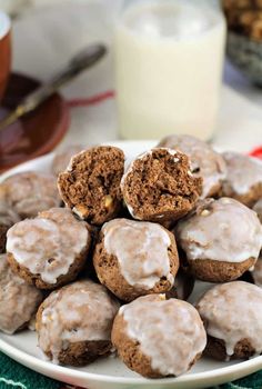 a plate full of chocolate spice cookies with frosting on top and the words tetu above it