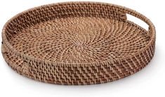 a round wicker tray with handles is shown