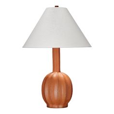 a brown table lamp with a white shade on the base and a light bulb attached to it