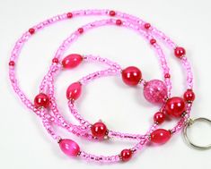 "\"PERFECT FUCHSIA\" This beautiful fuchsia or pink badge holder is perfect for pink lovers.  This is my personal favorite.  It is made of fuchsia glass pearls, cats eye, pink bead, and small beads.  It measures 19 inches long.  If you need different size just convoy me the message. This lanyard will come in lobster clasp.  You can choose a different clasp for the options. Thanks, for shopping with us!" Lanyard Pink, Pink Lanyard, Beaded Lanyard, Beaded Lanyards, Small Beads, La Rose, Cats Eye, Pink Beads, Badge Holder