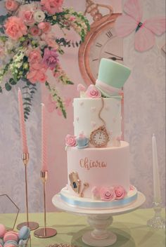 a three tiered cake sitting on top of a table