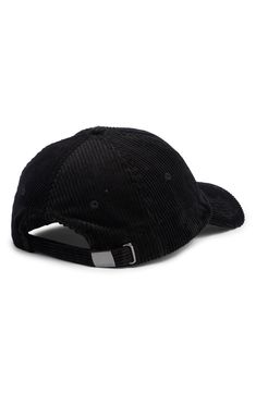 a black corded hat with a metal buckle on the front and an adjustable visor