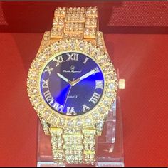 Brand New 1000% Authentic Mens Charles&Raymond 14k Gold Plated Fully Iced Lab Diamond Watch Blue Diamond Watch With Round Dial, Gold Diamond Watch With Vvs Clarity For Anniversary, Blue Diamond Watches For Formal Occasions, Formal Blue Diamond Watches, Blue Diamond Watch For Anniversary, Blue Diamond Watch With Diamond Hour Markers For Anniversary, Blue Timeless Diamond Watch, Blue Diamond Watch With Diamond Hour Markers, Formal Gold Bling Jewelry And Watches