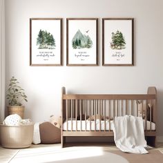 a baby's room with three pictures hanging on the wall