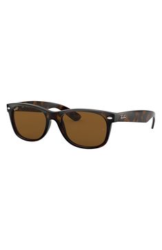 Classic sunglasses in a slightly smaller silhouette are complete with logo hardware at the temples for a signature flourish. 55mm lens width; 18mm bridge width; 145mm temple length 100% UV protection Crystal lenses Propionate Made in Italy Ray-Ban style number: RB2132 Classic Tortoiseshell Wayfarer Sunglasses, Classic Brown Wayfarer Sunglasses, Italian Sunglasses, New Wayfarer, Protection Crystals, Classic Sunglasses, Rectangular Sunglasses, Polarized Lenses, Square Sunglasses